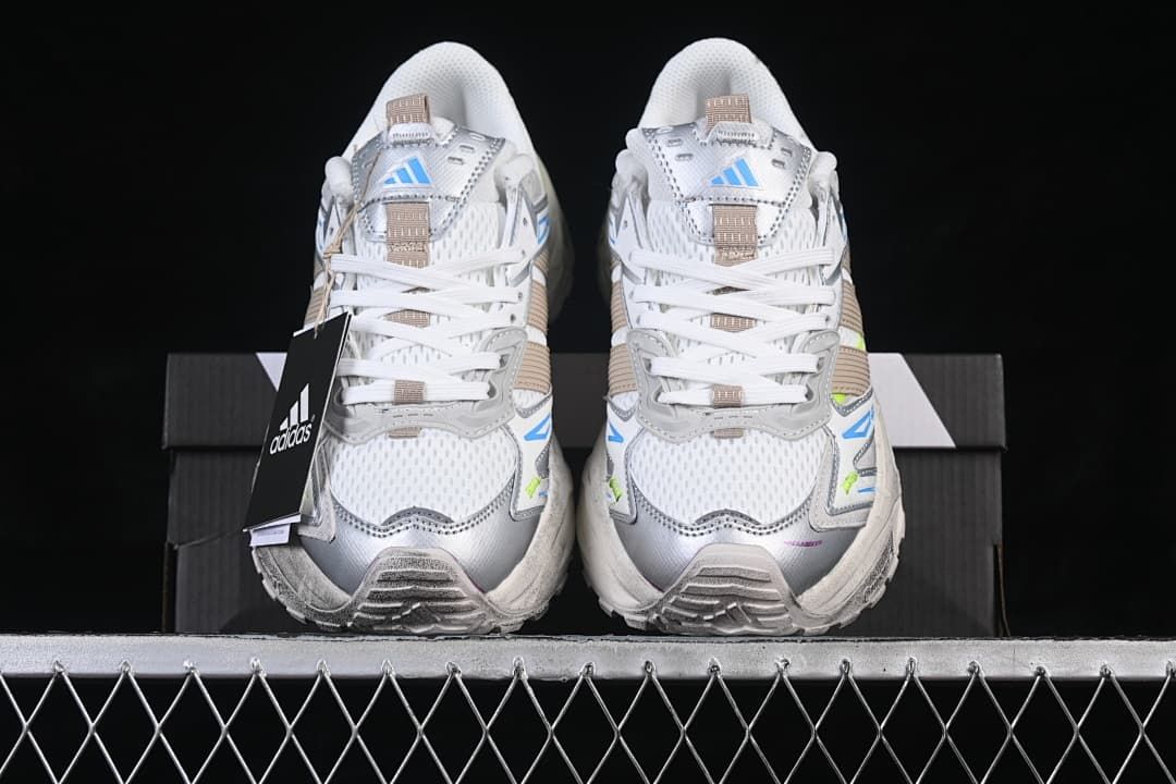 Front view of the pair showing the mesh-look toe panels and lace-up design.