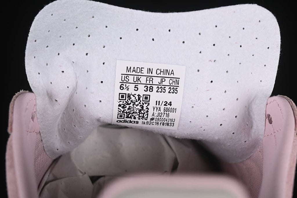 Size and model label inside the sneaker tongue