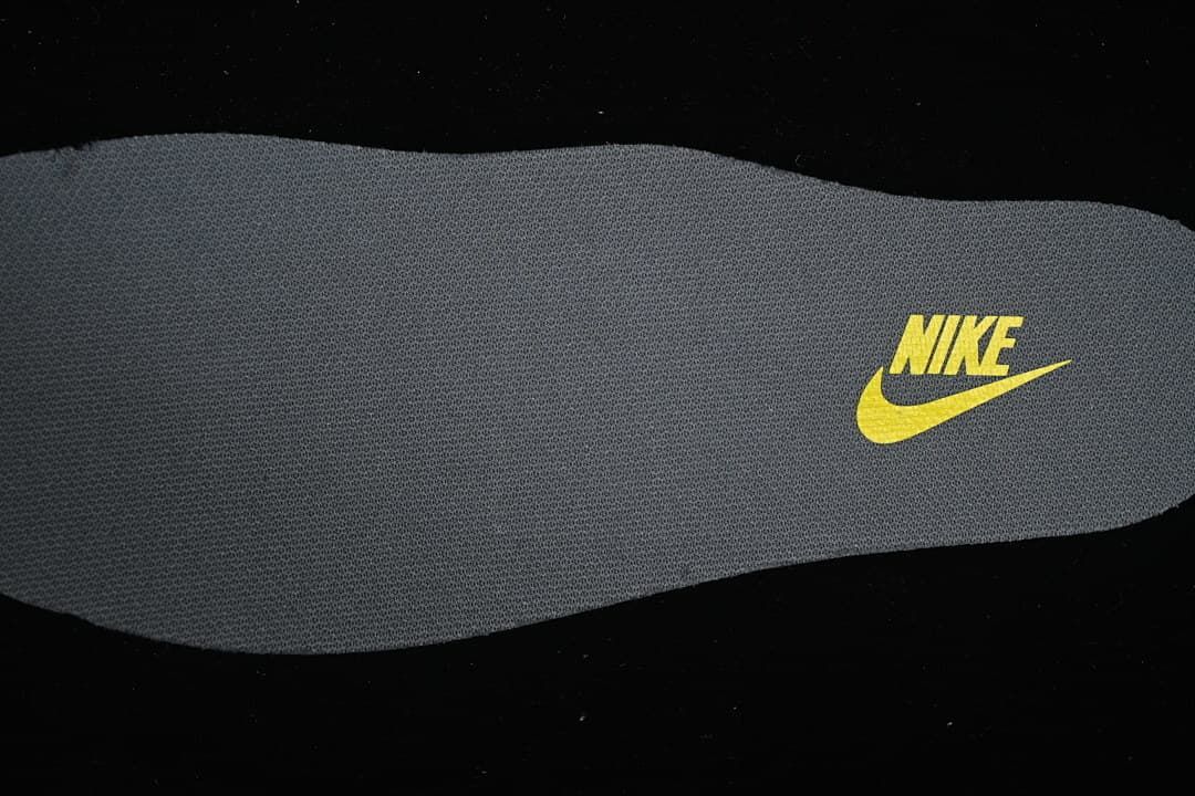 Close-up of the gray insole with Nike branding.