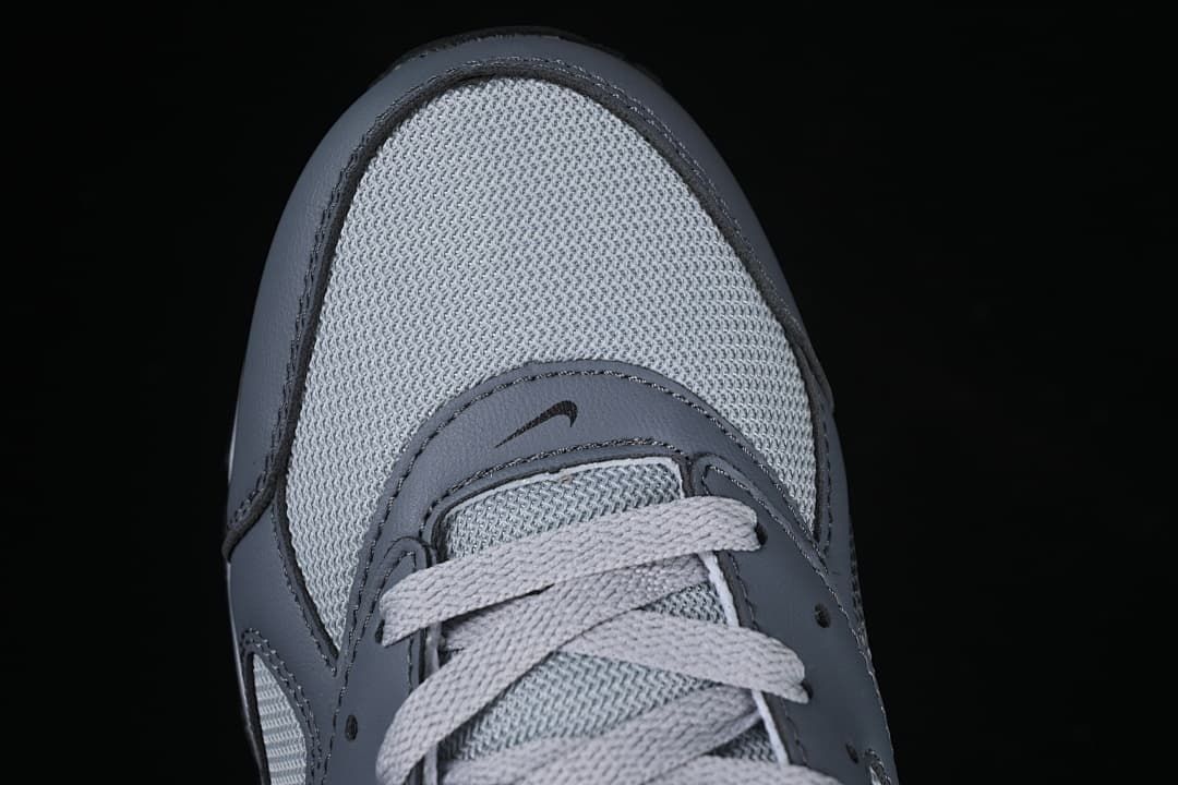 Top view of the mesh toe, lace area, and grey overlays