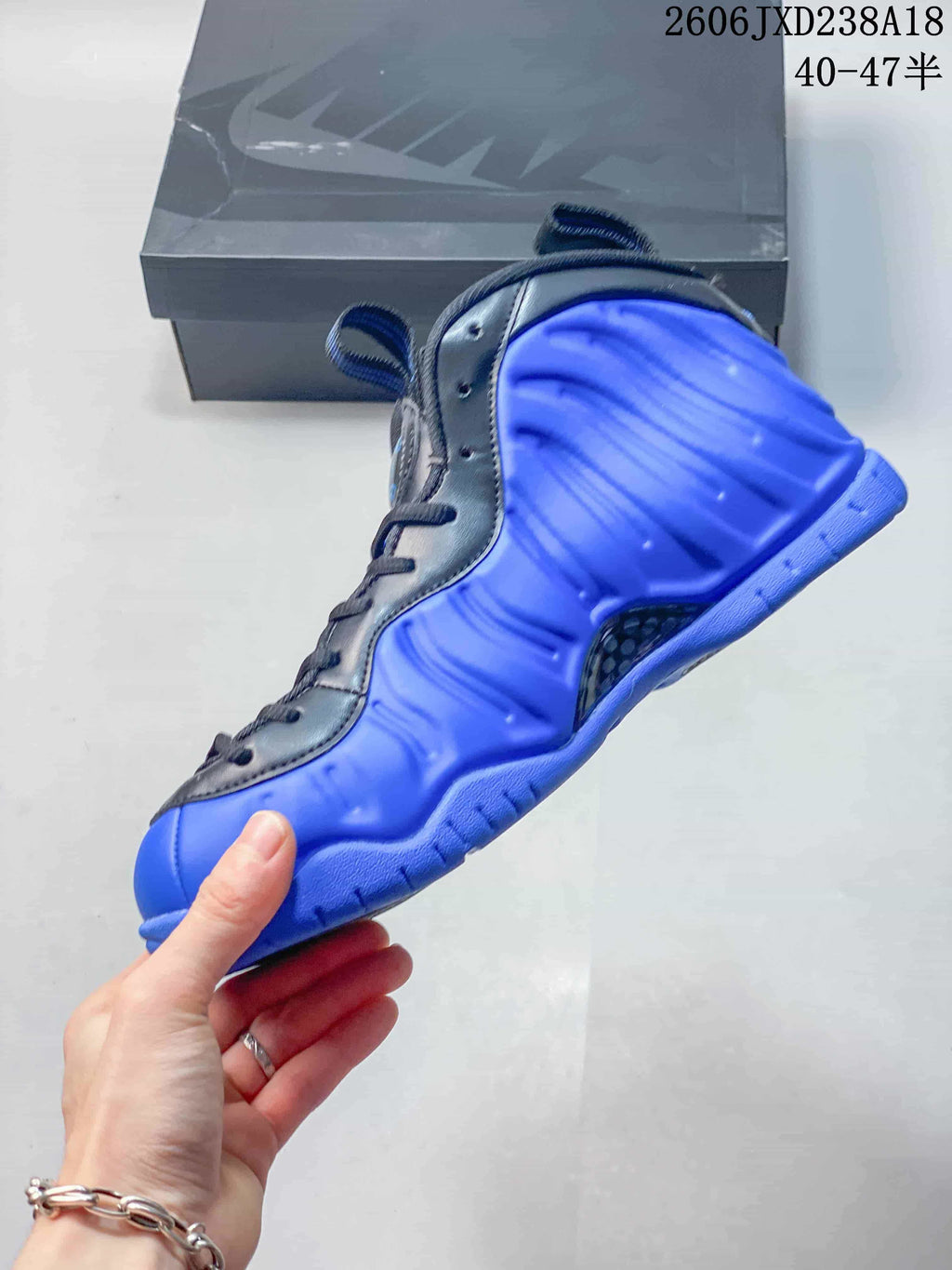 Side profile highlighting the molded blue panels and dark overlays