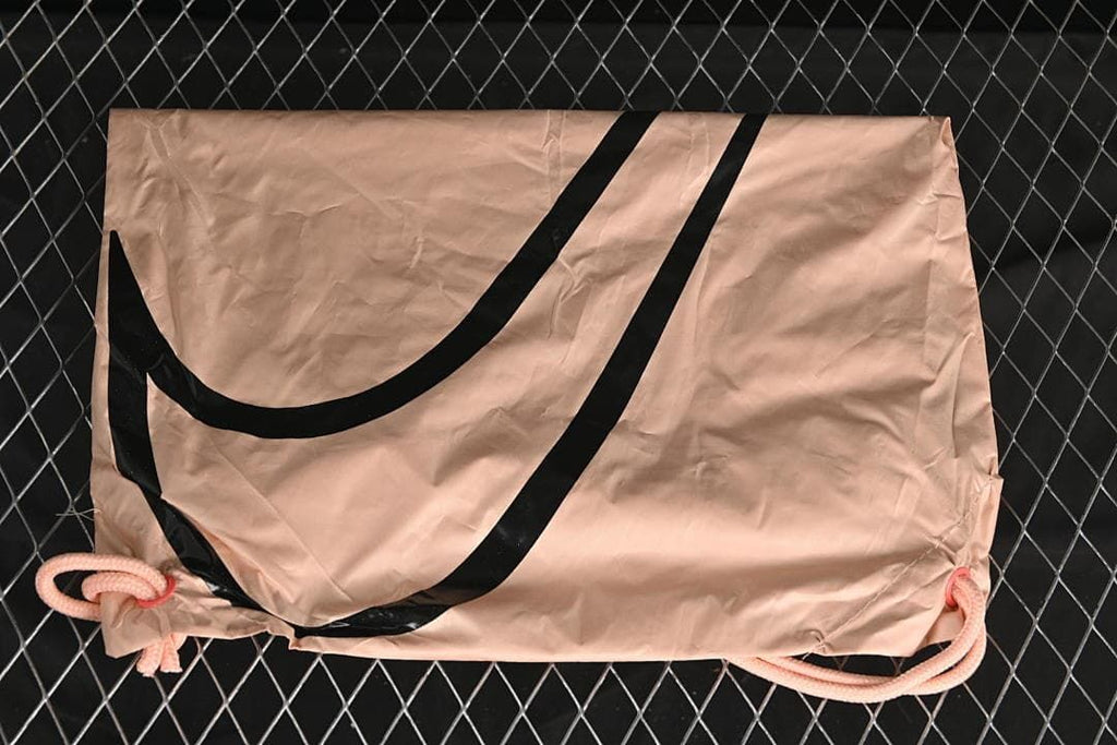 Nike-branded drawstring shoe bag shown against a dark background
