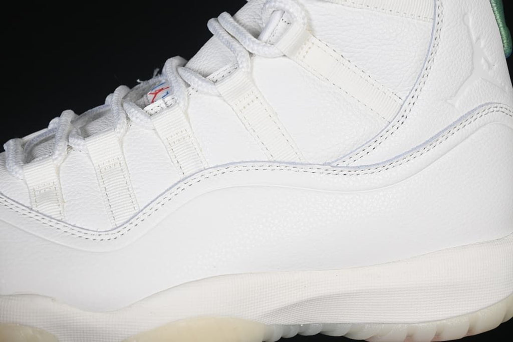 Close-up of the white side panels, stitching, and lace loops.