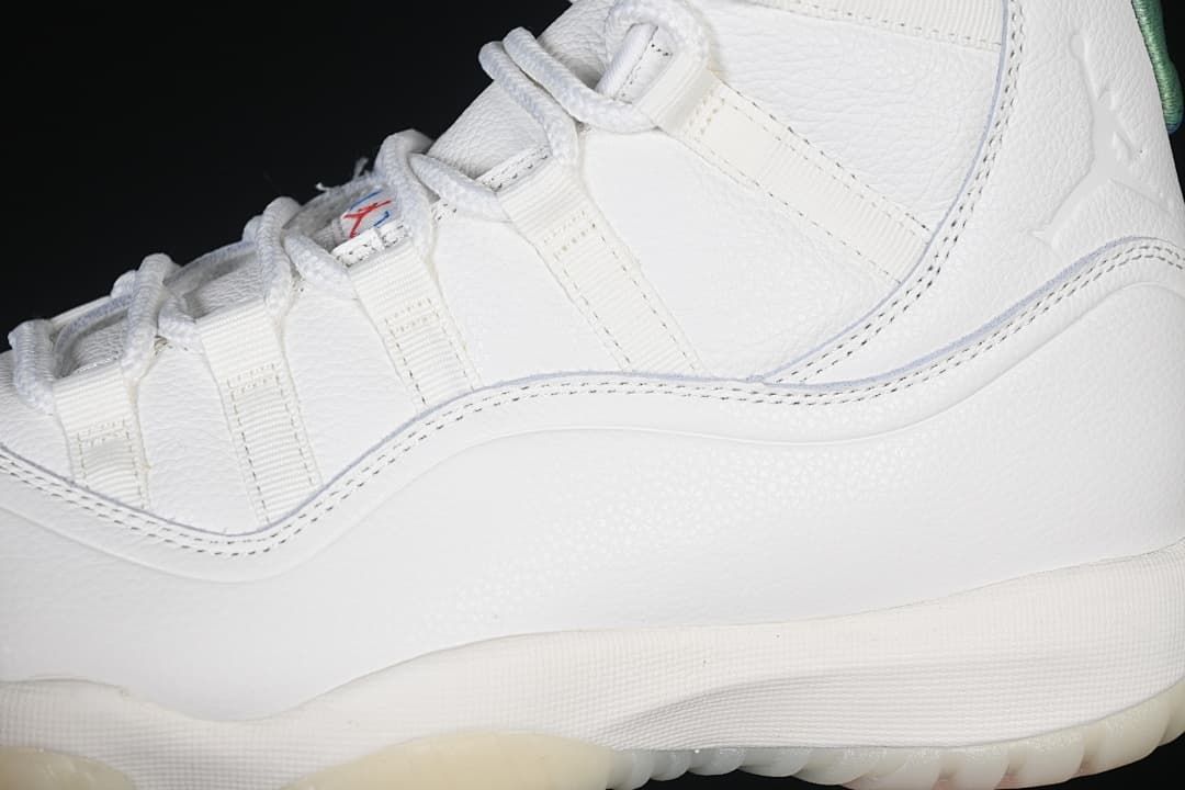 Close-up of the white side panels, stitching, and lace loops.