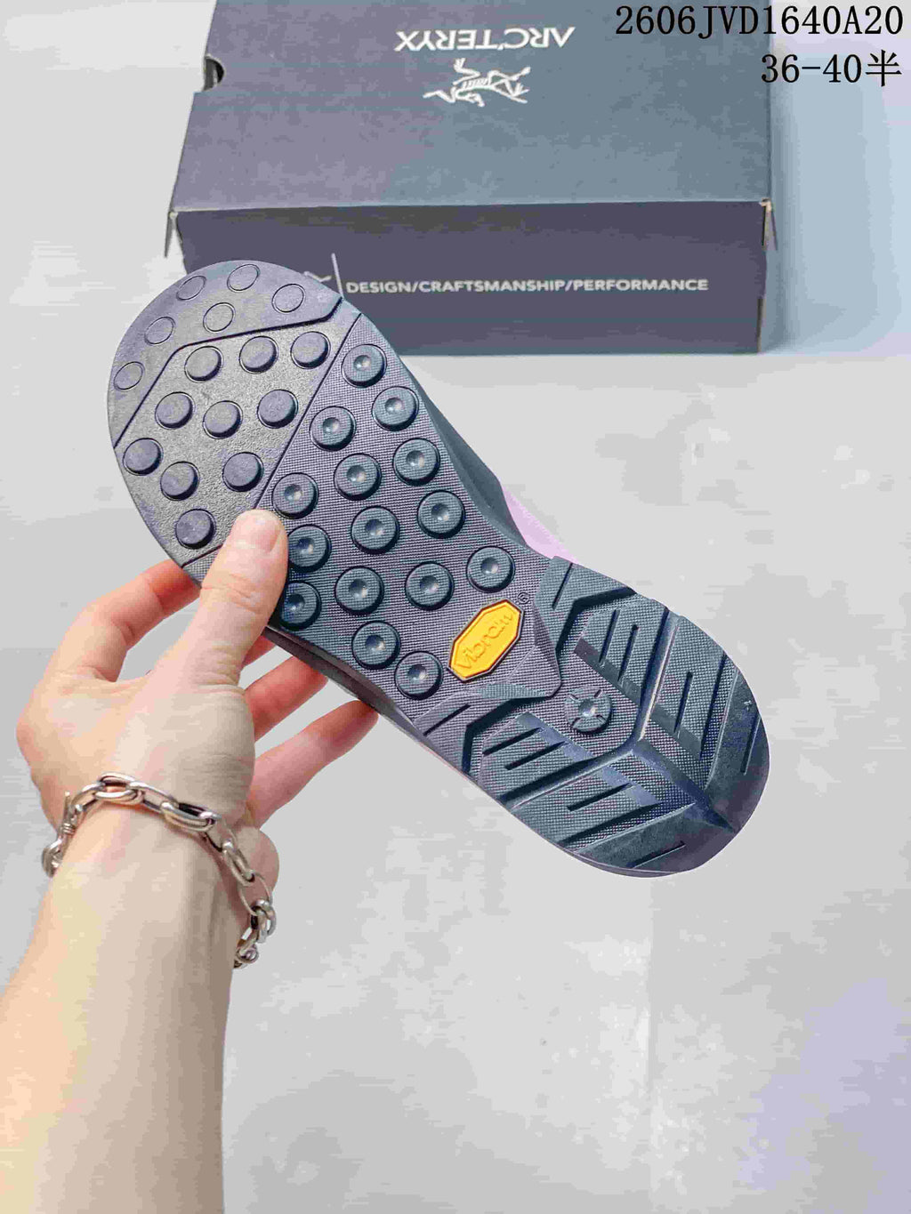 Close-up of the trail shoe outsole with circular tread details
