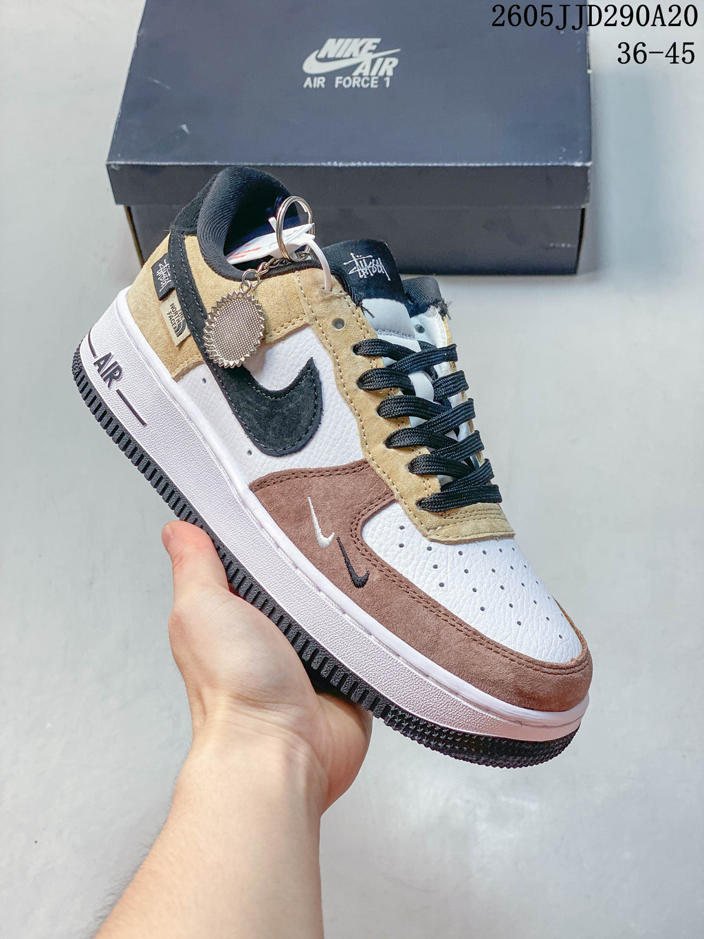 Angled side view of a Nike Air Force 1 Shadow sneaker with layered panels and multiple Swoosh details
