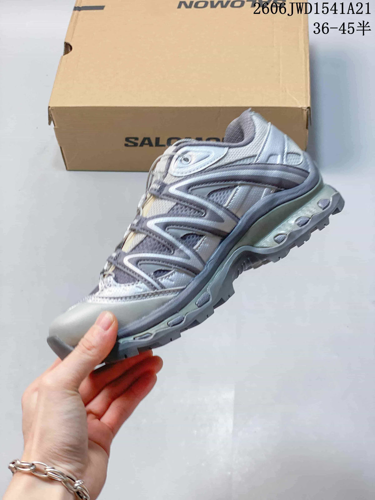 Side view of the silver and gray Salomon XT-Quest ADV sneaker.