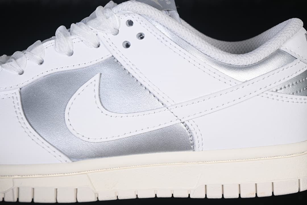 Close-up of the white Swoosh and silver side panels