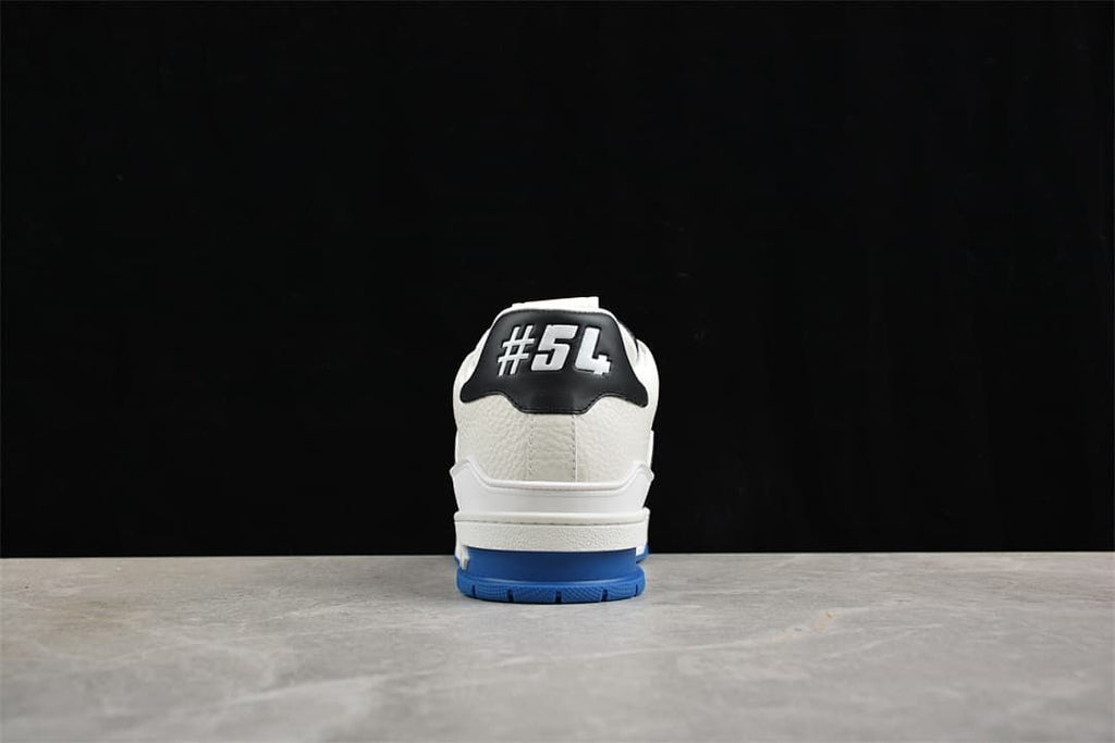 Rear view of the LV Trainer sneaker with black heel panel