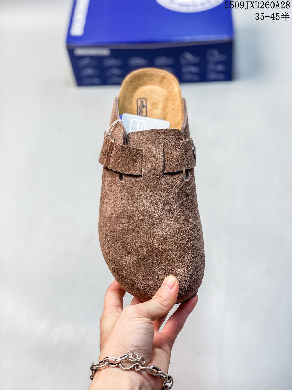 Top view of the mule showing its rounded closed toe and broad strap