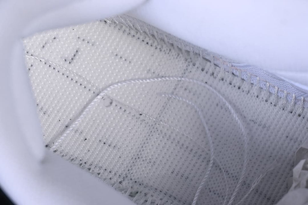Close-up of the perforated lining and interior stitching