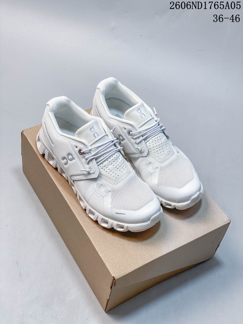 Pair of white On Cloud 5 sneakers shown from above.