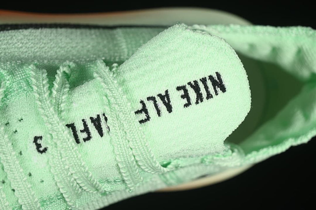 Close-up of tongue branding and laces