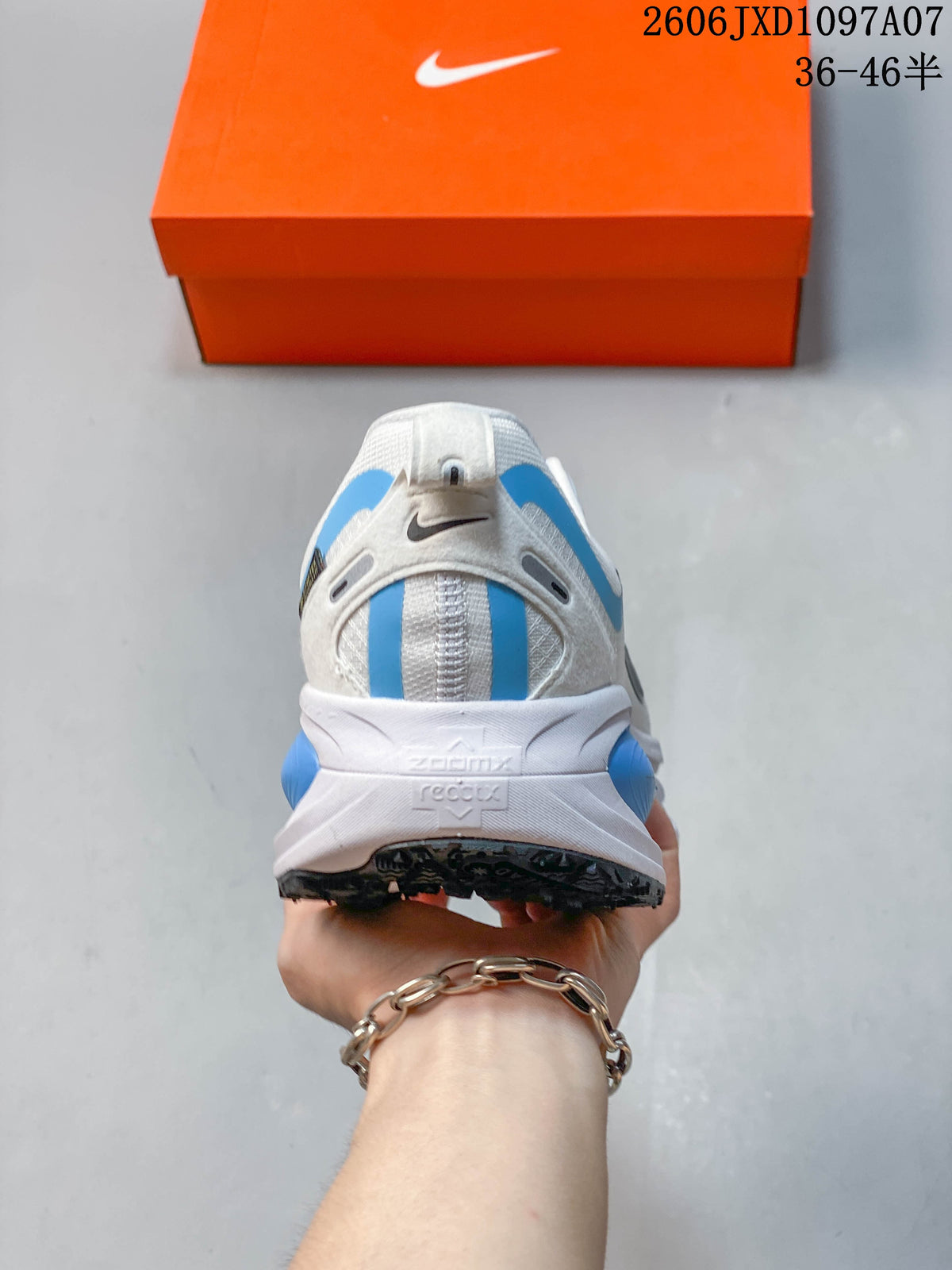 Rear view of the white and blue shoe showing its heel and sole