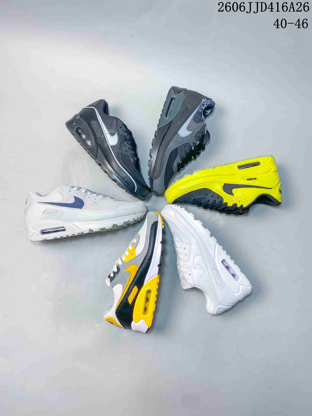 Several Nike Air Max 90 colorways arranged together.