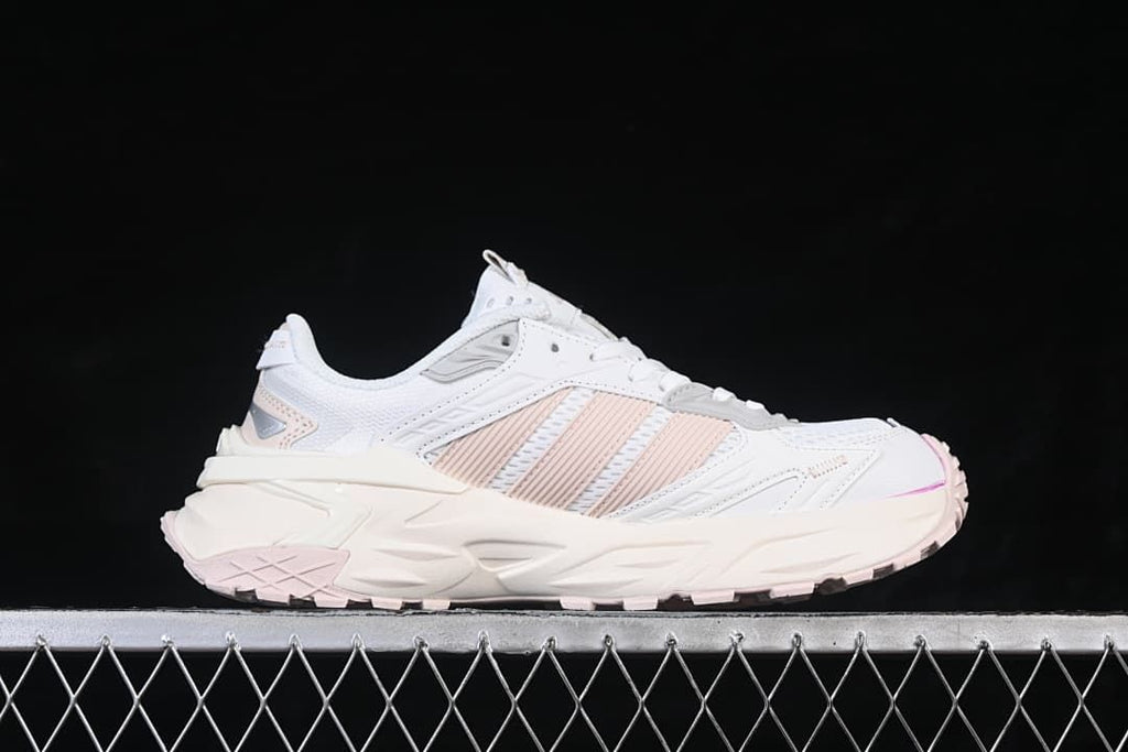 Side profile of the sneaker highlighting its layered upper and sculpted sole