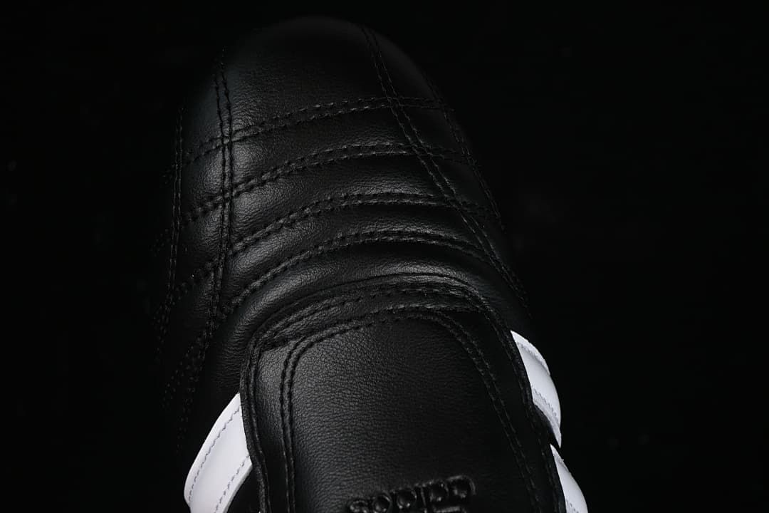 Top-down detail of the stitched black toe area.