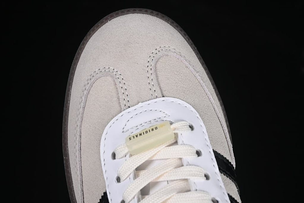 Top-down close-up of the sneaker toe and lacing