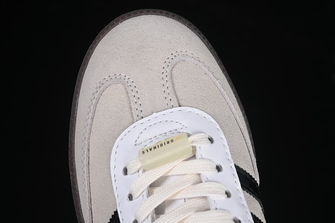 Top-down close-up of the sneaker toe and lacing