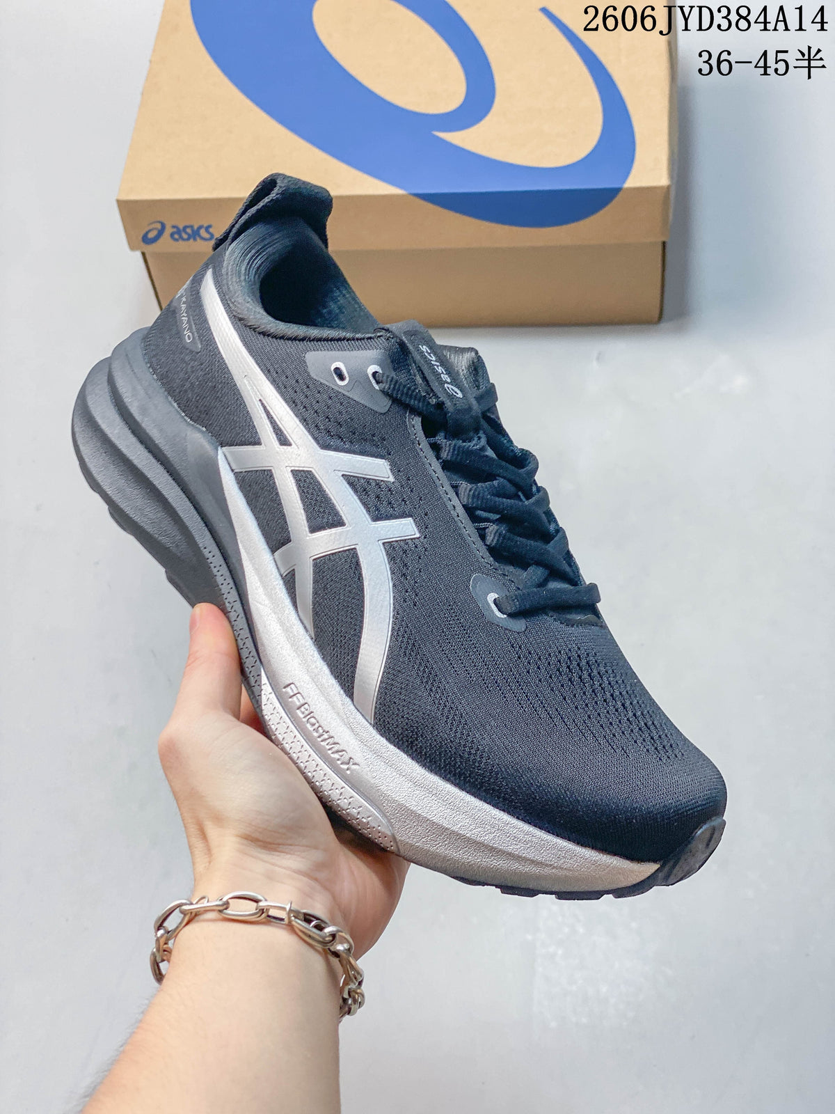 Angled side view highlighting the navy upper, silver stripes, and thick sole