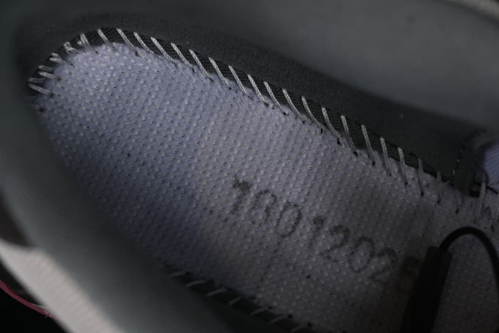 Close-up of the shoe interior and insole stitching.