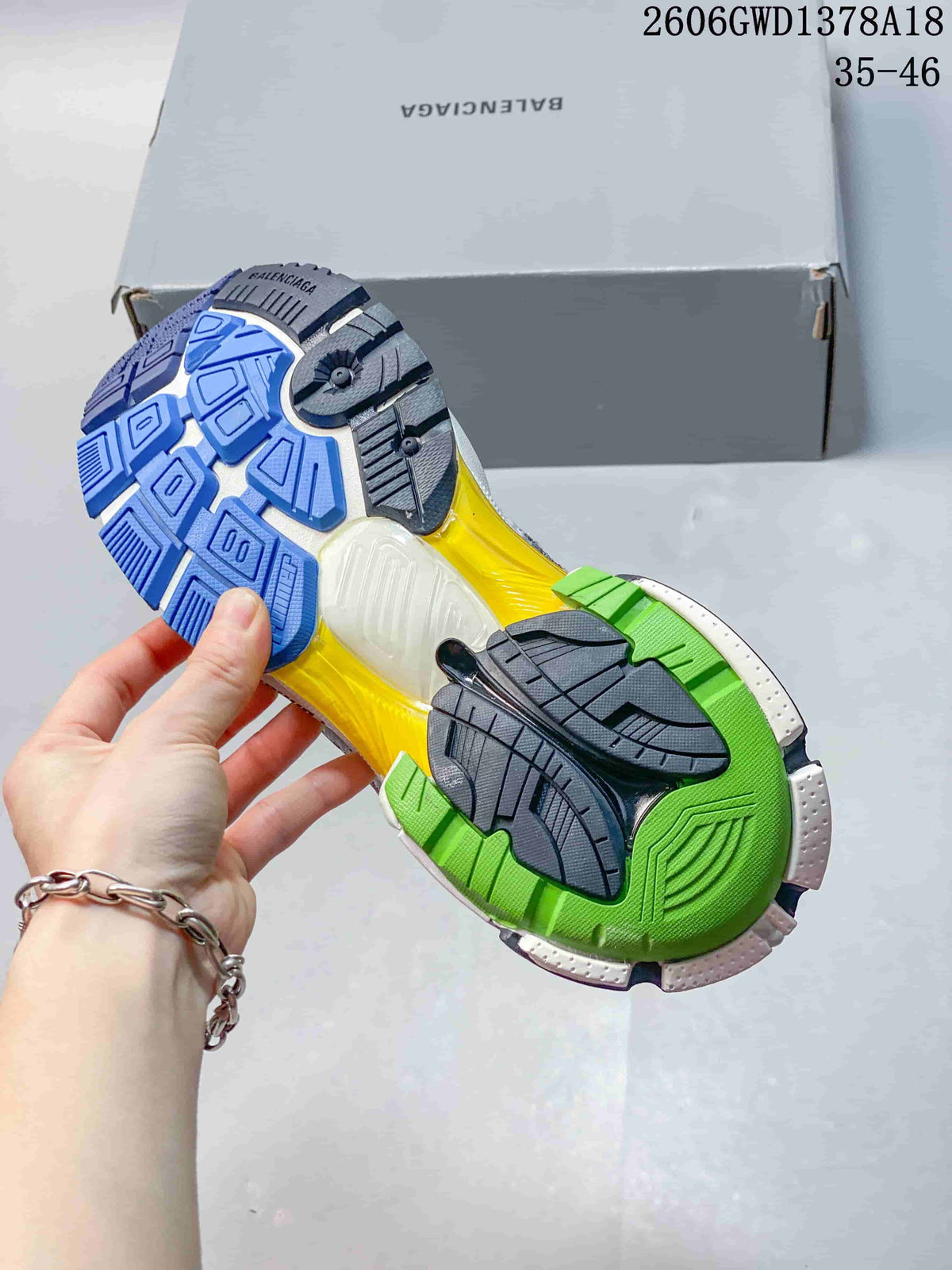 Underside of a Balenciaga Runner sneaker showing its multicolor outsole