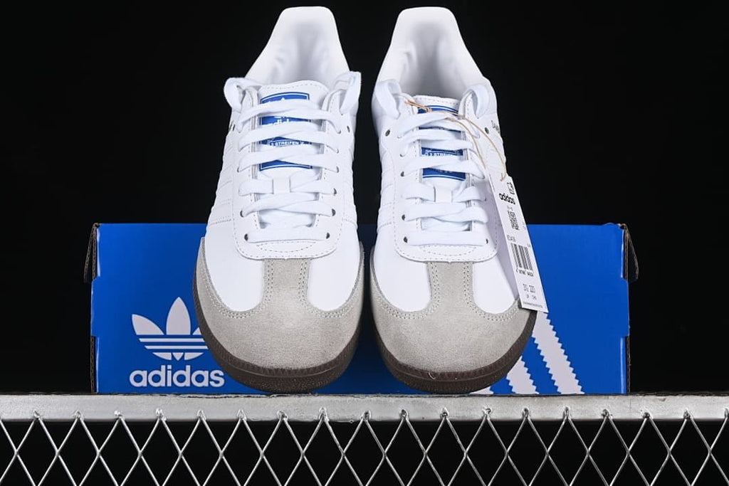 Front view of the pair showing the light gray toe panels and white laces