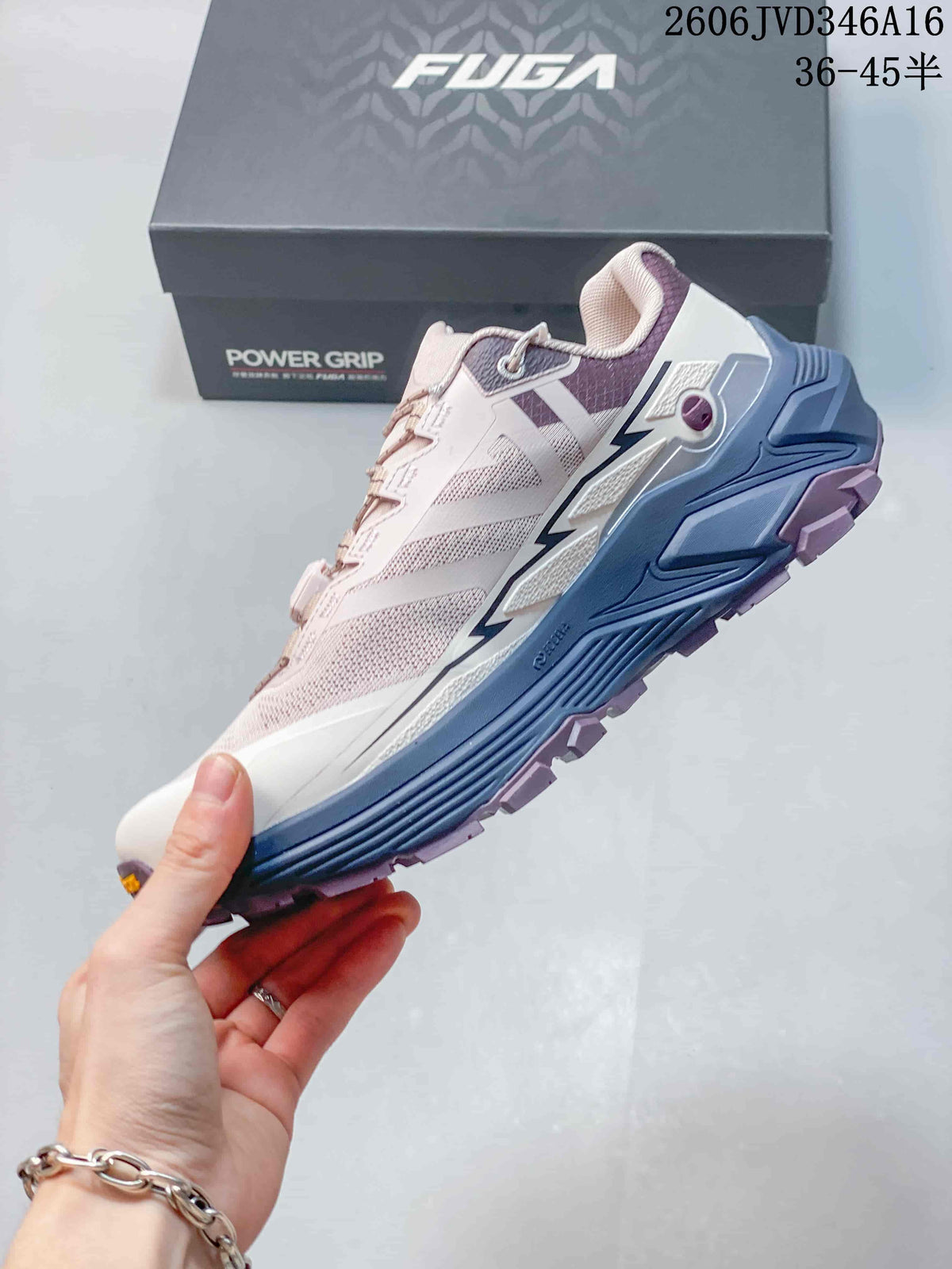 Side profile of the pale pink and white trail shoe with blue midsole and purple outsole details.
