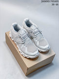 Pair of light grey On Cloud 5 sneakers shown on a box