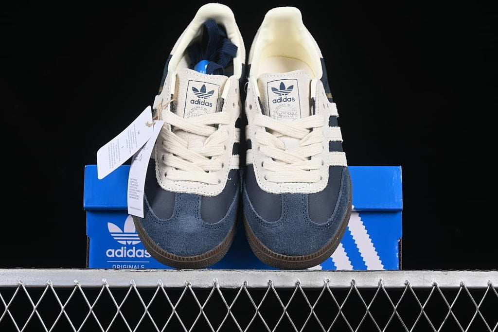 Front view of the pair displayed on a blue shoe box