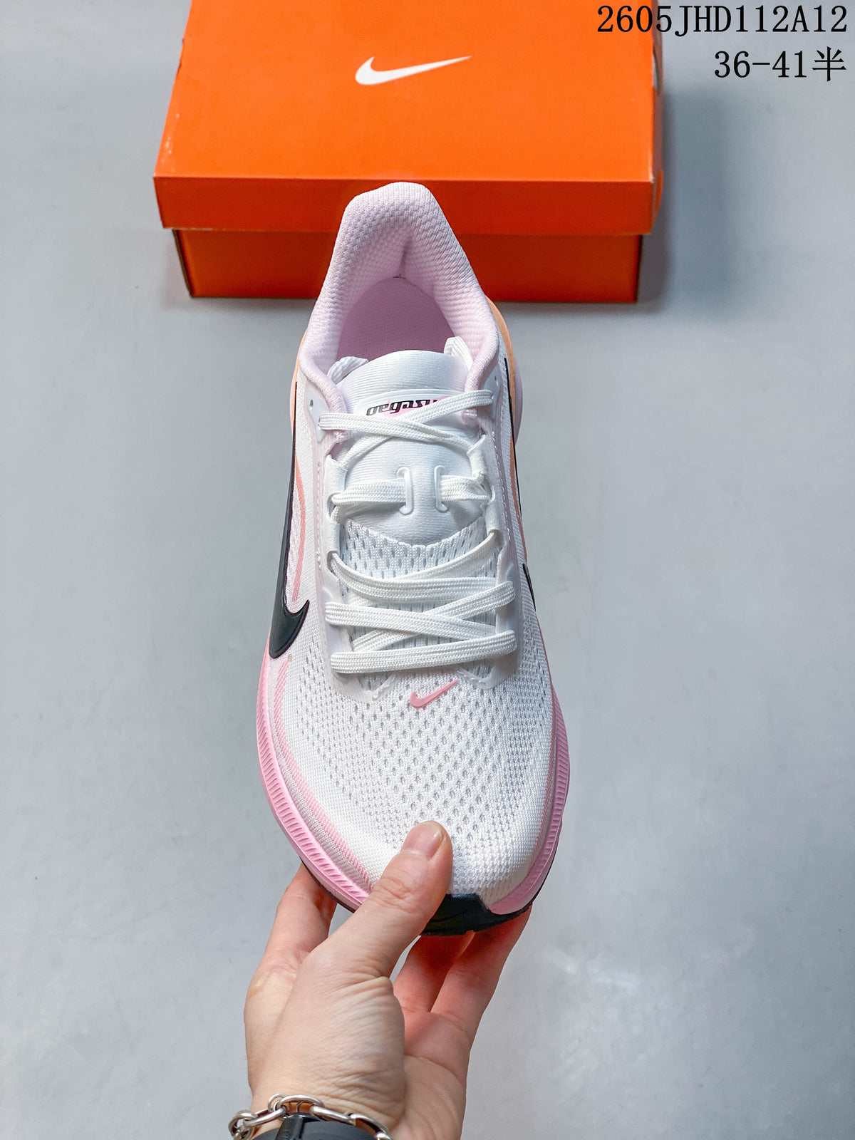 Front view of the white and pink running shoe with white laces.