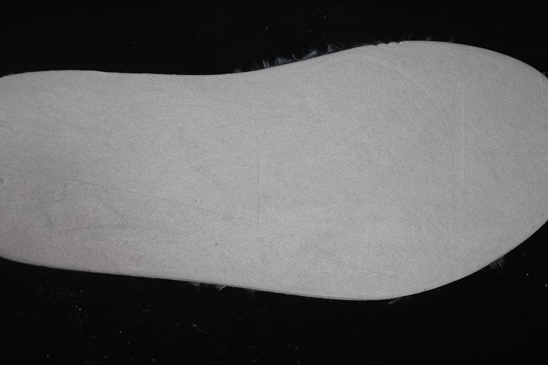 Close-up view of the light-colored insole