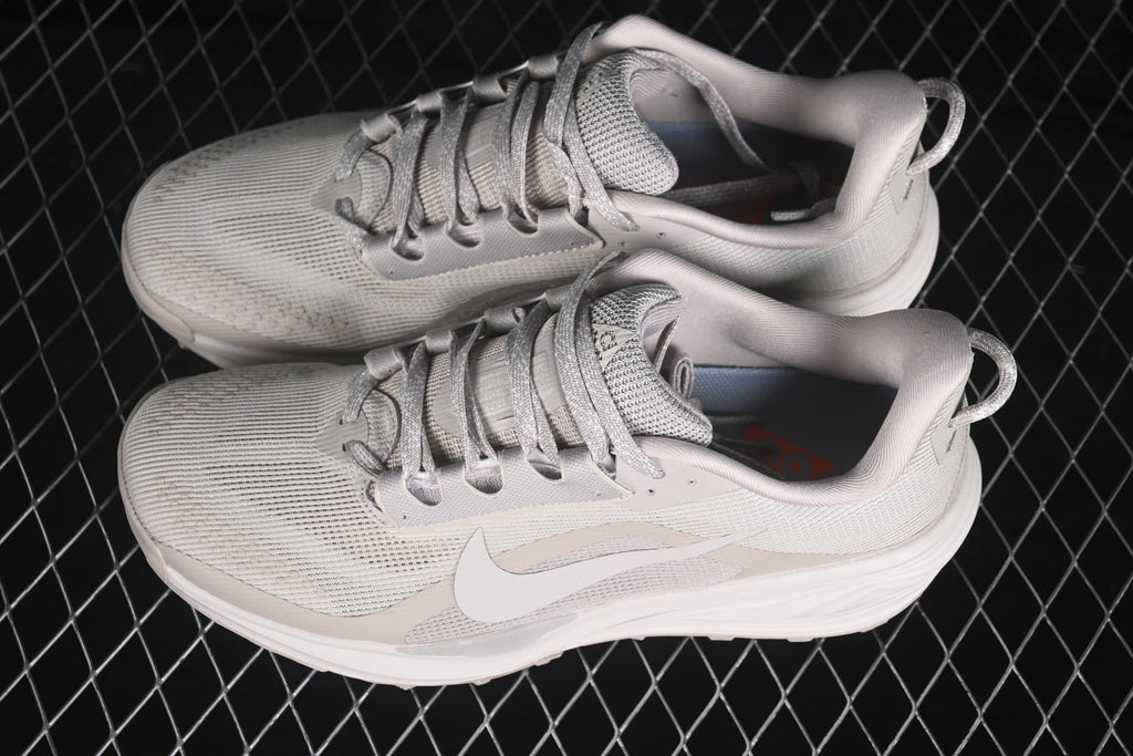 Angled top view showing the mesh upper, padded collar, laces, and side Swoosh branding.