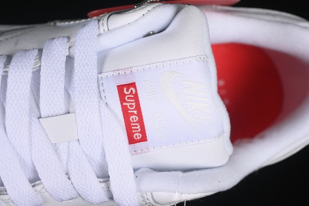 Close-up of the tongue label and white laces