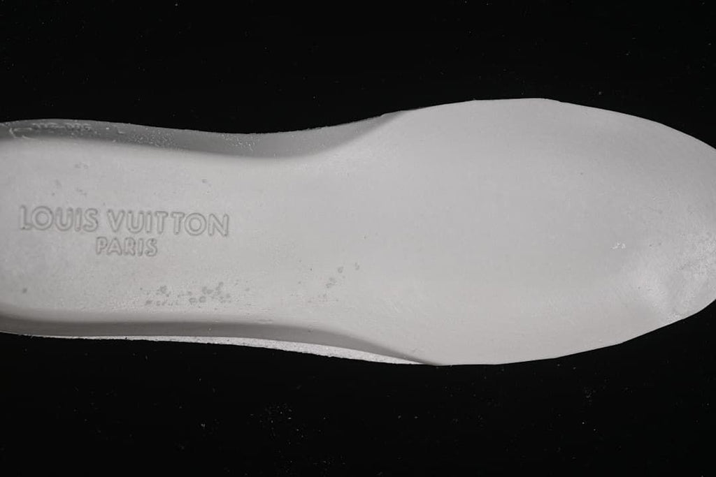 Close-up of the sneaker outsole with Louis Vuitton Paris lettering