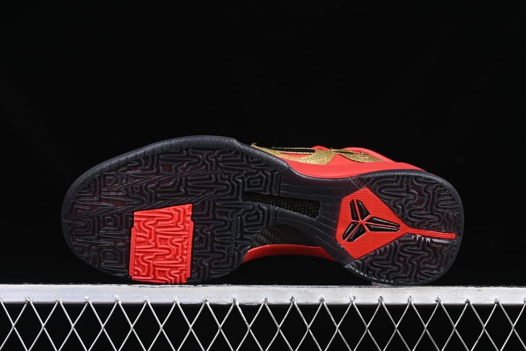 Underside view showing the patterned black and red outsole