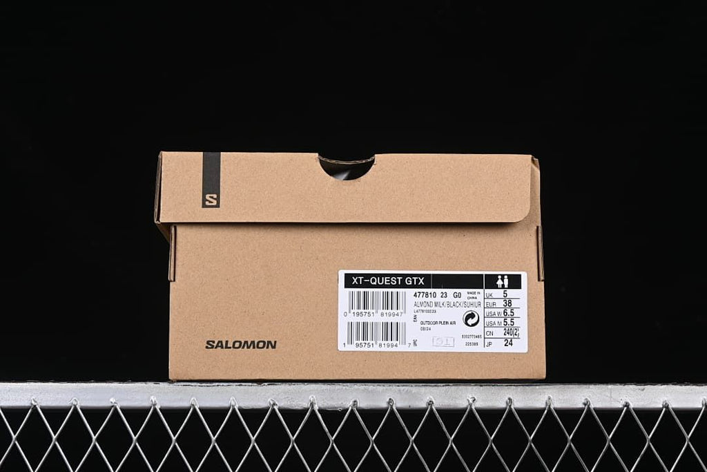 Shoe box label showing XT-Quest GTX, color description, and EU 38.