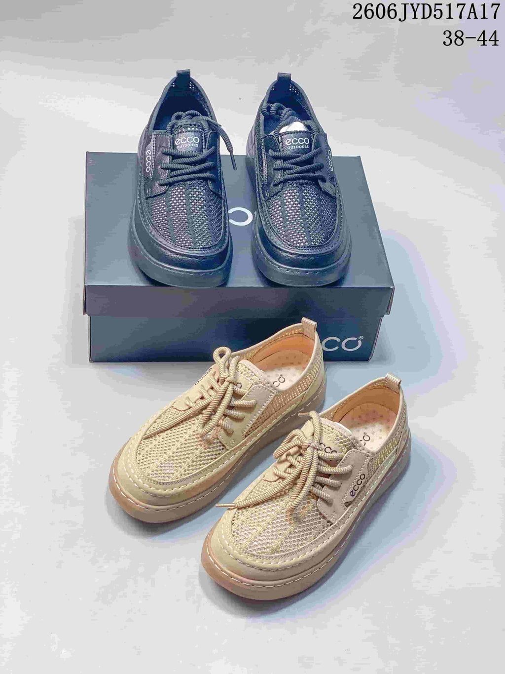 Dark navy and light beige ECCO-branded lace-up shoes shown together.