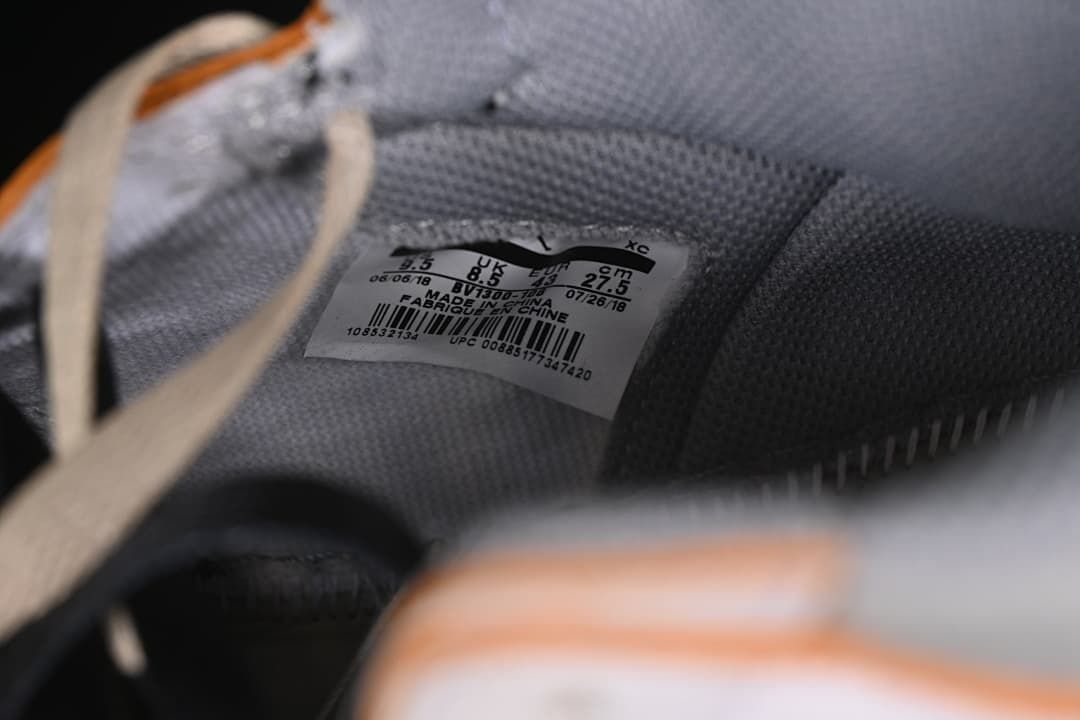 Interior size label photographed inside the sneaker