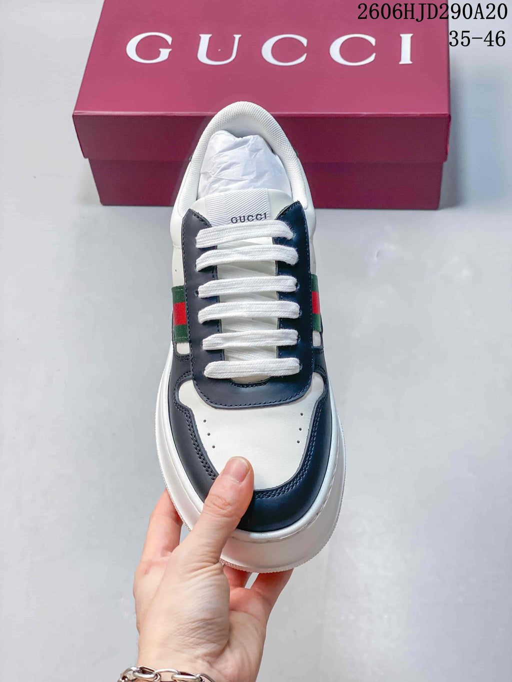 Top view showing the rounded toe, navy overlays, and white laces