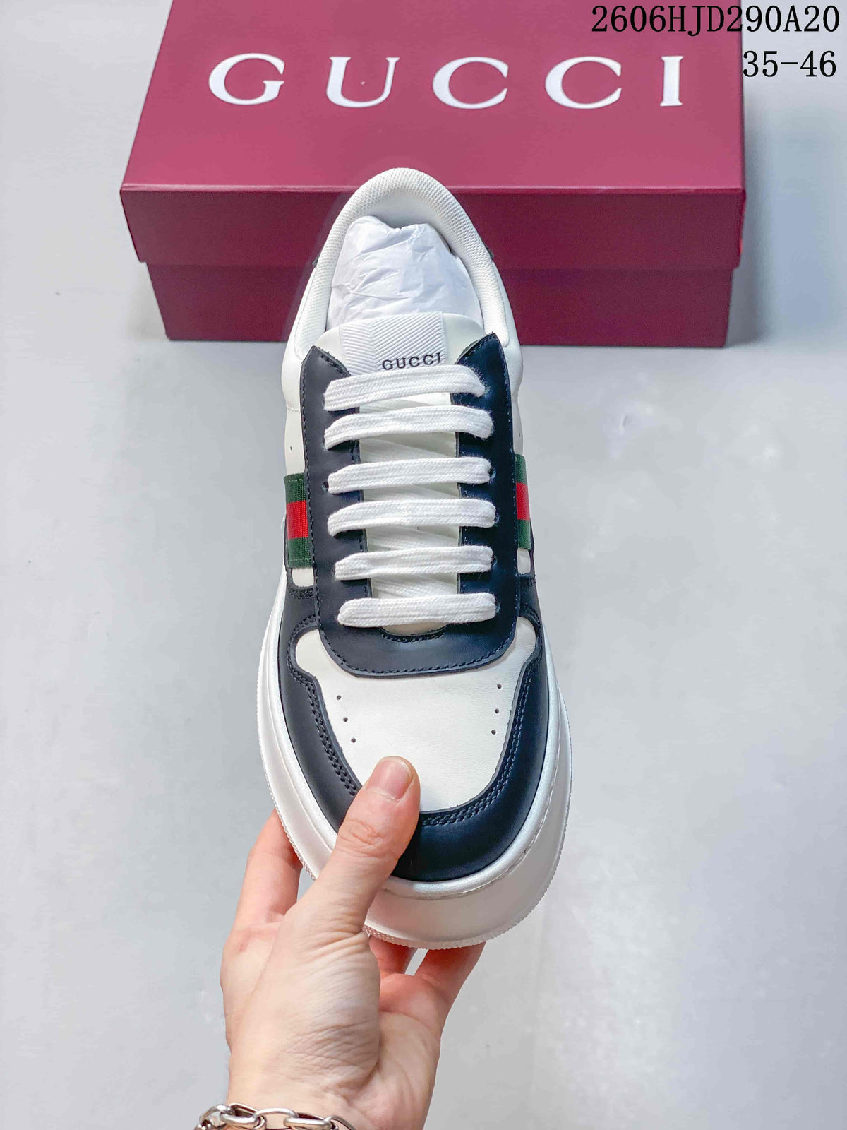 Top view showing the rounded toe, navy overlays, and white laces