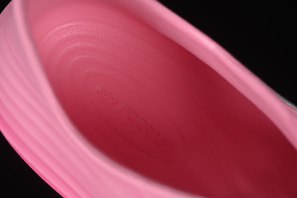 Close-up of the pink clog footbed with subtle molded branding.