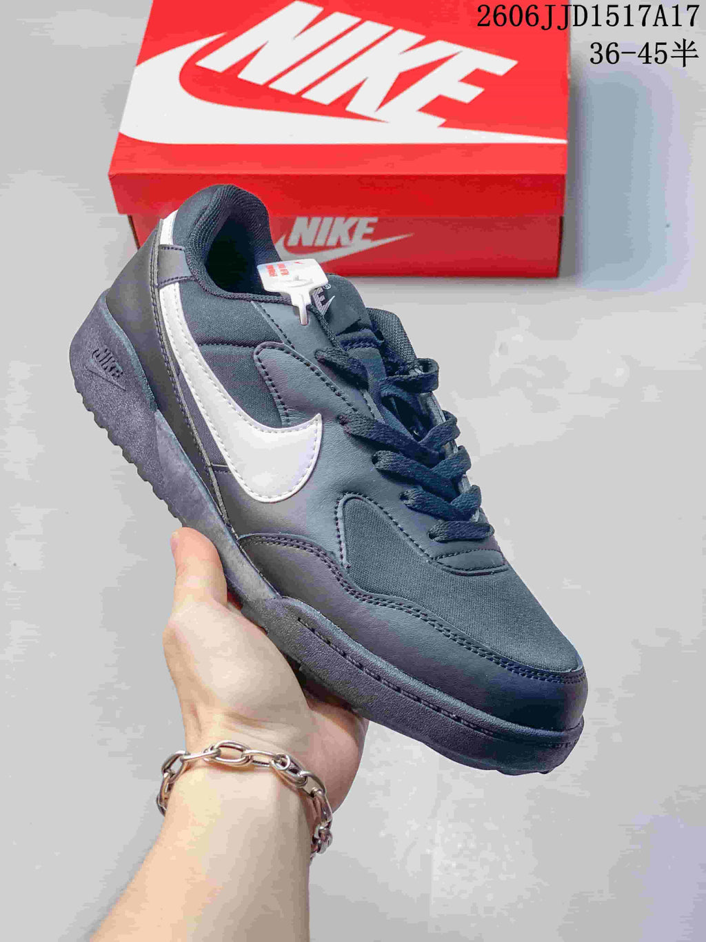 Dark gray Nike Terra Manta sneaker with a white Swoosh