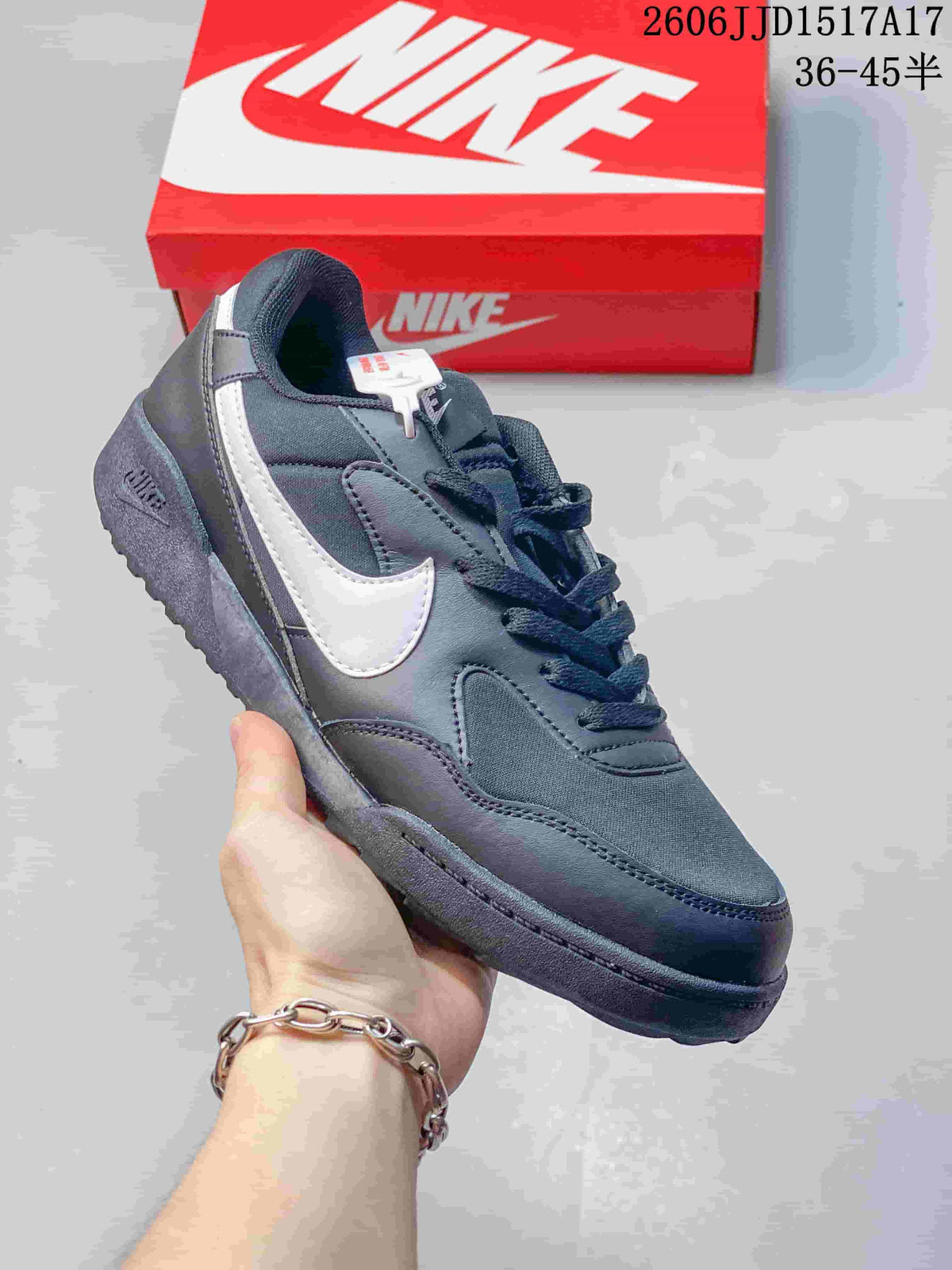 Dark gray Nike Terra Manta sneaker with a white Swoosh