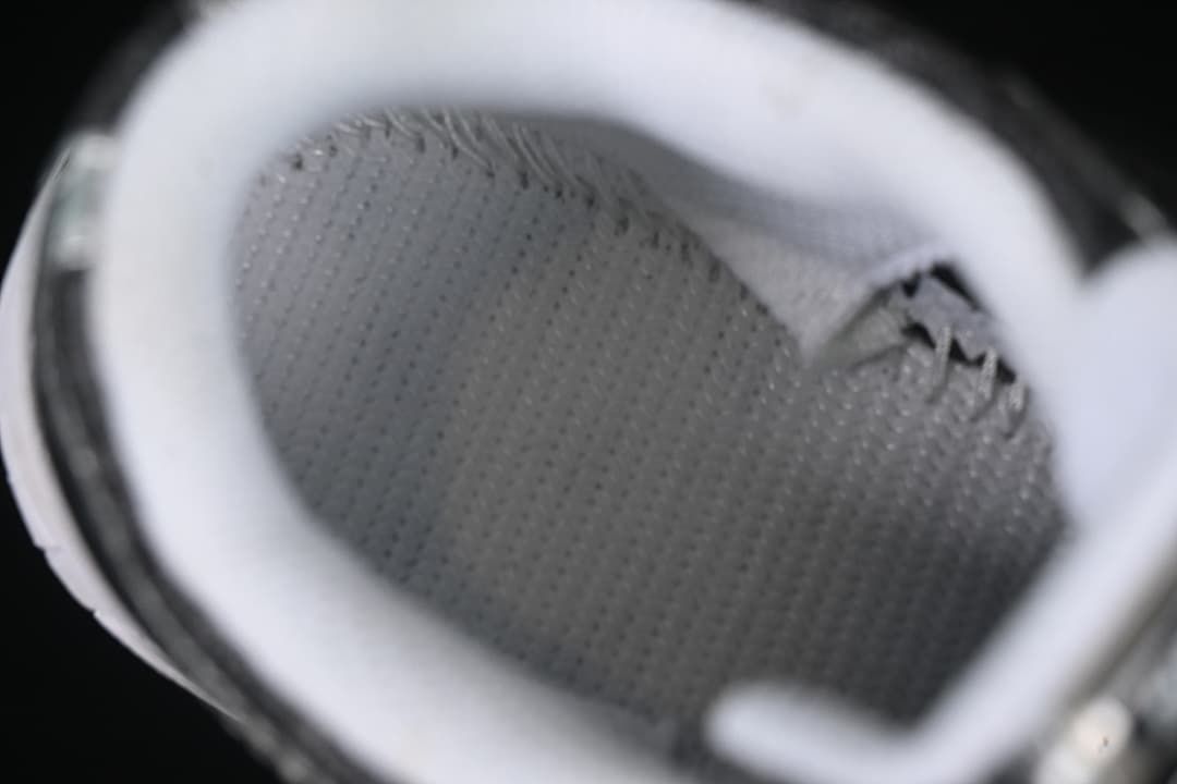 Close-up view inside the sneaker showing the padded collar and lining
