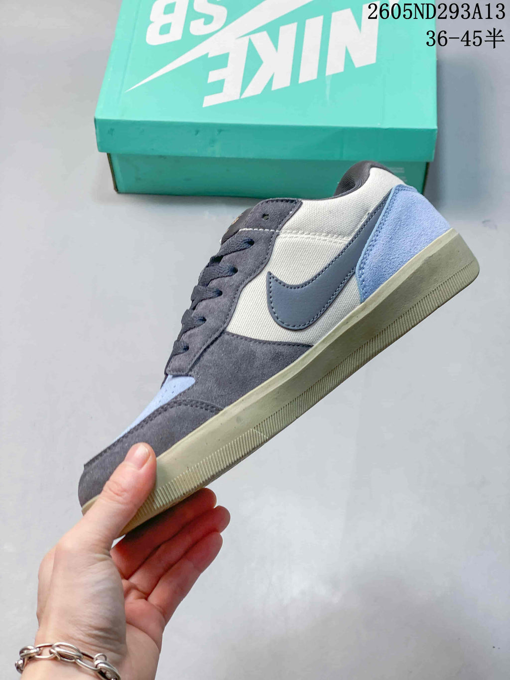 Side view of a Nike SB Force 58 shoe with contrast panels and gum-tone sole