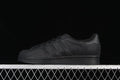 Side view of black adidas Superstar EG4961 low-top sneaker