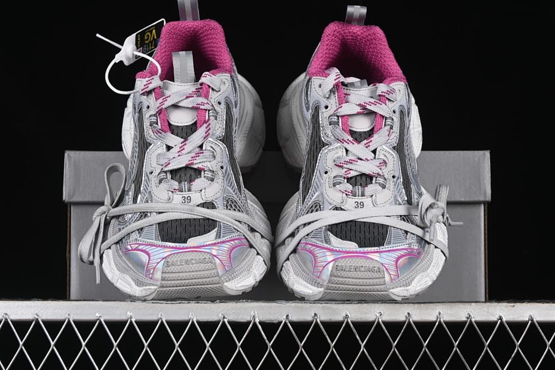 Front view of the pair showing pink collars and contrasting laces
