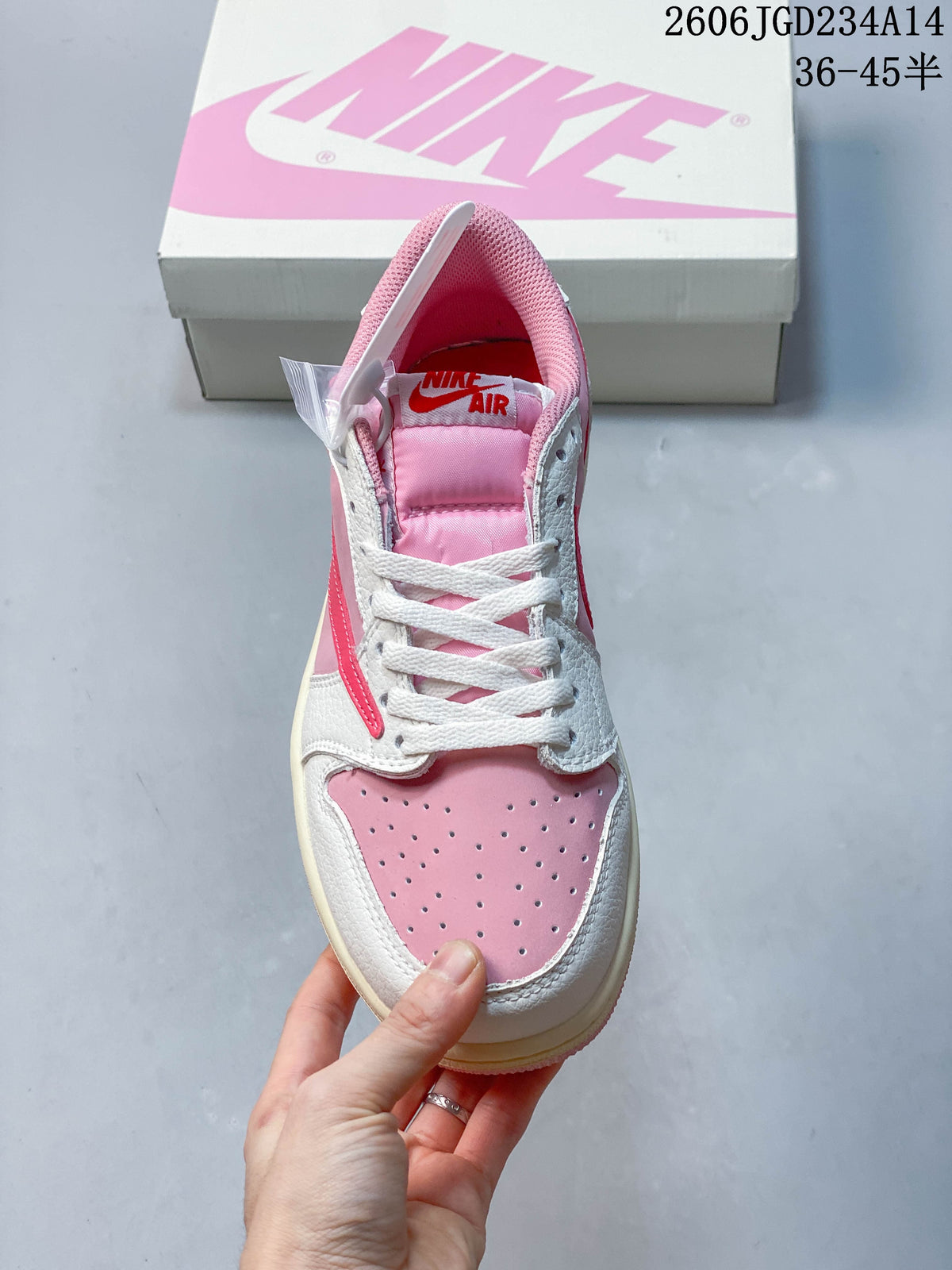 Front view showing the perforated pink toe box and white laces