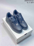 Dark blue Nike Air Force 1 '07 LV8 sneakers on a box